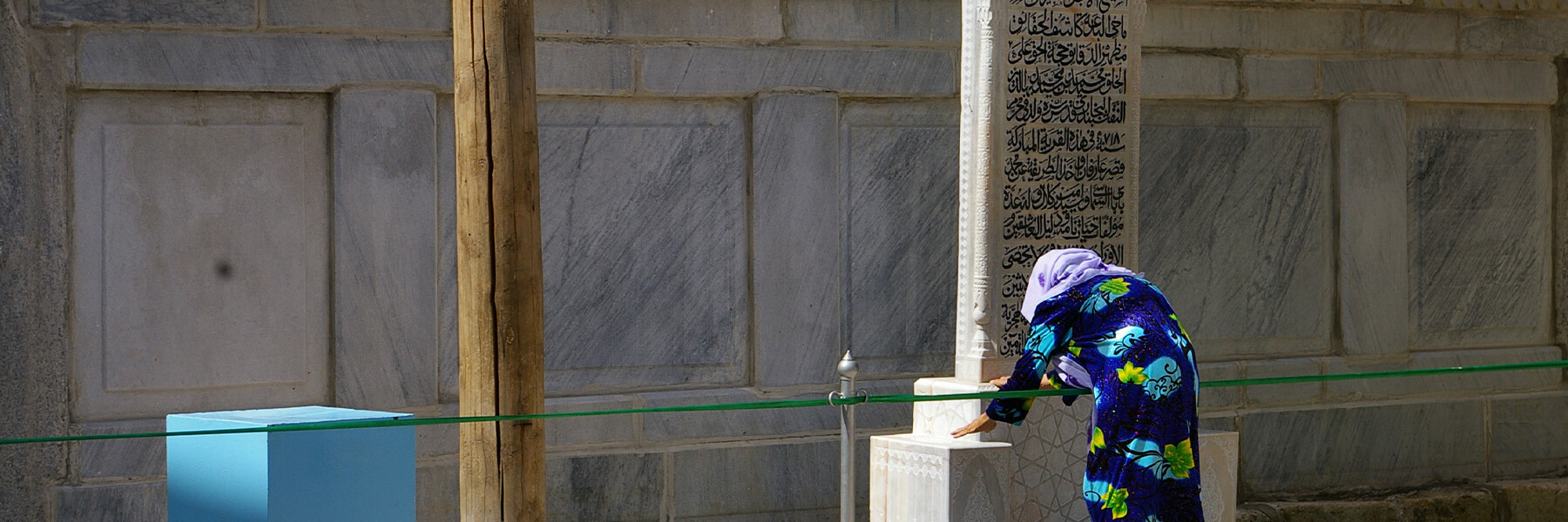 A woman looking at the Baha al-Din Naqshband Shrine in Uzbekistan